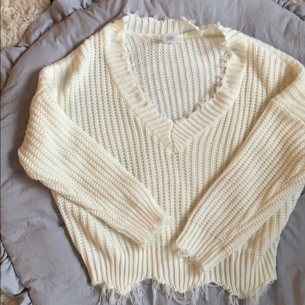 Cream distressed V neck sweater